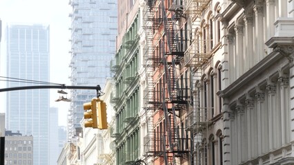 New York City Manhattan Soho fashion district near Broadway street. USA urban building facade, old classic american architecture. Shopping in NYC, United States. Business and residential real estate.