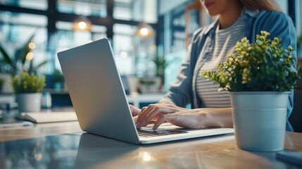 Tech Savvy CloseUp of Creative Hands Typing on Sleek Laptop in Contemporary Office Setting