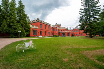 Romantic castle with red facade. Hradek u Nechanic. Czech Republic. Nechanice. Panoramic exterior...
