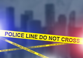 Obraz premium Police line in city. Yellow tape with text do not cross. Police line for crime scene. Area in metropolis is sealed off. Police line in front of skyscraper silhouettes. Quarantine, ban. 3d image