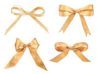 Beautiful golden bows isolated on white, set