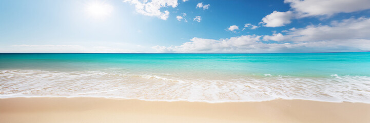 Fototapeta premium Tranquil beach with clear turquoise waters lapping onto white sandy shore under a partly cloudy sky, tropical travel nature relaxation tourism