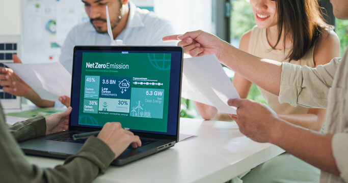 Closeup group diverse Asia businesspeople talk ESG strategies risk management workshop, SDGs report, global warming, green finance and investment and net zero waste in boardroom training building. - Powered by Adobe