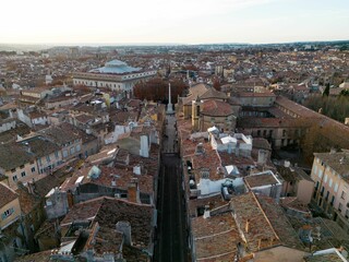 Historic European city Aix-en-Provence with tiled rooftops and narrow streets on a clear day.