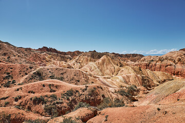 Picturesque Skazka Canyon on the southern shore of Issyk-Kul lake, Kyrgyzstan. Travel destination,...