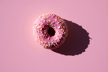 pink donut on a pink background
