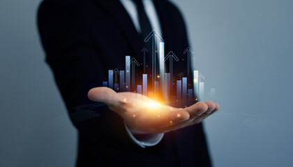 Business growth graph and investment analysis.Development and growth chart.Businessman draw graphic...
