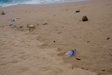 garbage on the beach, by the sea. Environmental pollution, ecology