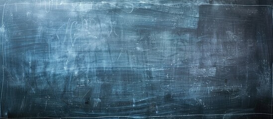 Obraz premium Close-up of a chalkboard texture for an educational concept, with space for an image. Copy space image. Place for adding text and design