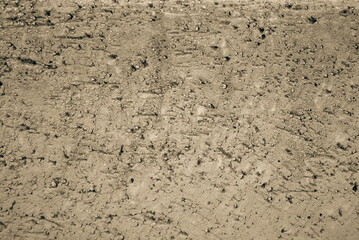 Sepia Toned Textured Earth Surface Close-Up View