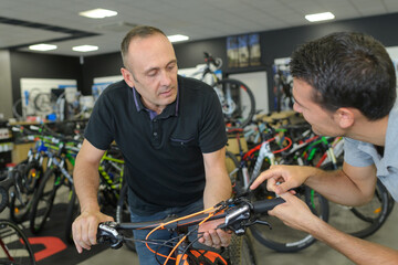 a man buying a bicycle