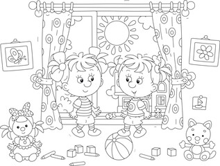 Funny little girls sitting on a windowsill in a nursery room with scattered toys and talking happily on a sunny summer day, black and white vector cartoon illustration for a coloring book