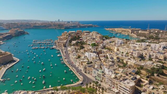 Drone top view of cities, marina, boats, yachts, sea, road. Malta island