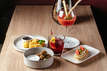 cocktail snacks. an aperitif for cocktails. cocktail bar menu