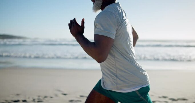 Fitness, health and black man by beach running for race, workout or marathon training with wellness. Sports, energy and mature African male athlete runner by tropical ocean or sea for cardio exercise