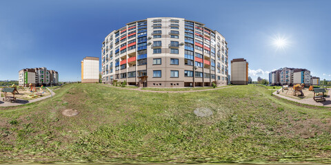 360 hdri panorama in middle of modern multi-storey multi-apartment residential complex of urban...