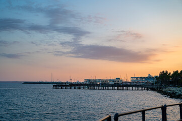 Fototapeta premium Sunset at Embankment Molos is a beautiful place in Limassol at Cyprus 