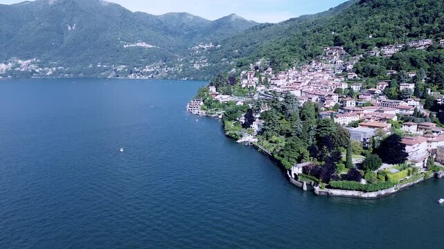 cinematic aerial shot about a typical Italian town on Como lake called Torno famous for its gardens and little romantic streets 3