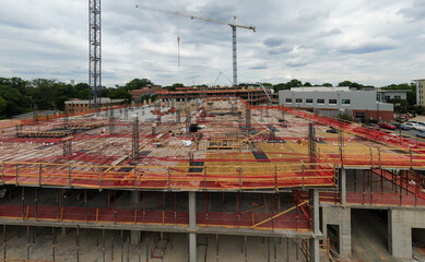 Daytime Drone Images of Highrise Construction and the Skyline in Downtown Raleigh North Carolina. Industry, Architecture, Engineering