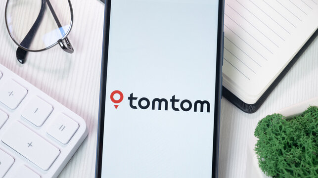 New York, USA - 21 June 2024: tomtom Logo on Phone Screen, Company Icon