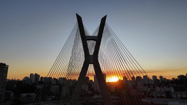 Aerial view of Oct&aacute;vio Frias de Oliveira Bridge, a landmark of S&atilde;o Paulo, during sunset - S&atilde;o Paulo, Brazil