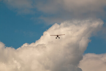 An amphibious airplane in the clouds
