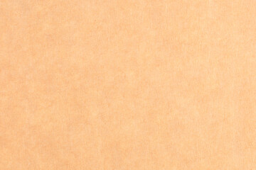 A tan background with no visible objects, texture background of retro vintage yellowed paper