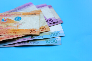 Philippine money, Banknotes on blue background.