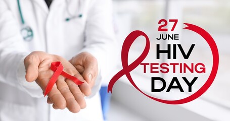 Banner for National HIV Testing Day with male doctor holding red awareness ribbon in clinic