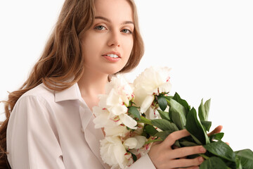 Beautiful young woman with bouquet of peony flowers, closeup