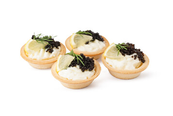 Tasty tartlets with black caviar on white background