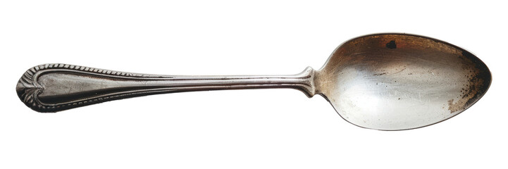 Antique silver spoon isolated. Old tarnished silver spoon, isolated on a white background with slight reflection.