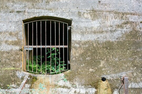 barred access in a hole in concrete