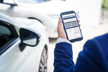 businessman in suit and car auto insurance agent assess car damage, discussing deductible, claims,...