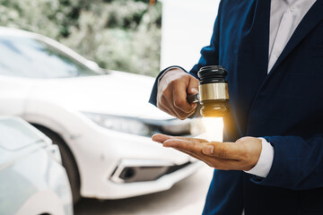 businessman in a suit and a lawyer, holding a wooden gavel, stand in front of a car, discussing legal aspects like citations, liability, and negligence related to a traffic violation...