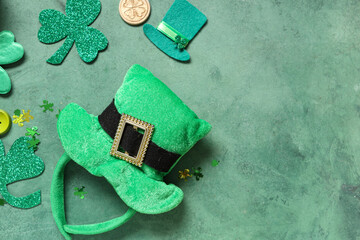 Leprechaun hat with decor on green grunge background. St. Patrick's Day celebration