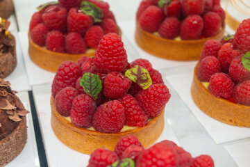 Sweet cake red fruits and berries framboise tartlets with cream