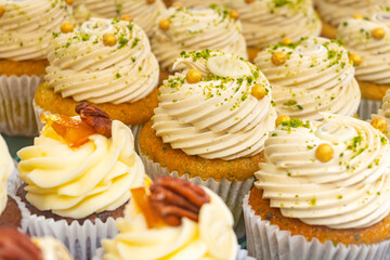 Sweet dessert fresh baked meringue cup cakes in bakery