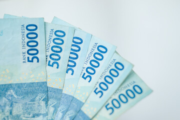 Series of Indonesian rupiah banknotes worth fifty thousand rupiah IDR 50,000 isolated white