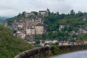 Naklejka premium Rocamadour medieval village located on pilgrims route in Lot department in southwestern France, attracted visitors for its setting in gorge above tributary of River Dordogne, panoramic view