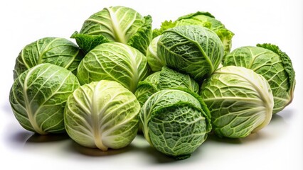 Fresh crisp green cabbage heads lies scattered on a clean white background, with subtle shadows and soft natural light.