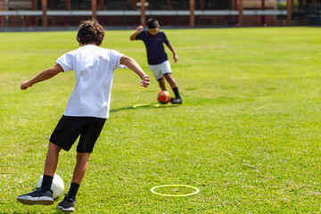 Kids' Soccer Practice in a Neighborhood Field