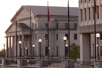 Jackson, Mississippi, USA - April 23, 2024: Twilight light shines on the historic Civic Center buildings of downtown Jackson.