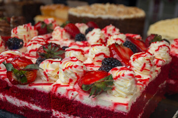 Red fruit sweet dessert red velvet tart with fresh strawberries  and whipped cream