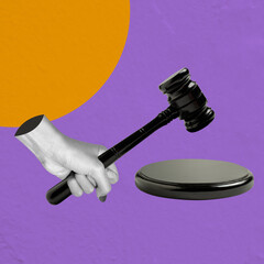 Human hand holding judge gavel