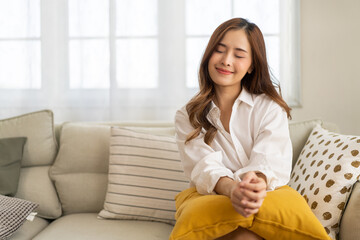 Obraz premium Portrait of smiling beautiful pretty asian woman clean fresh healthy white skin posing smile in pajamas white clothes, skincare, lady, model, cosmetic, fashion.Girl relax, enjoy at home.asia beauty
