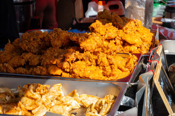 Korean food, asian fast food, fermented chicken pieces deep fried in oil