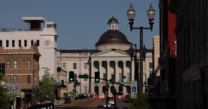 Sunny afternoon view of the historic buildings and skyline of downtown Jackson, Mississippi, USA.