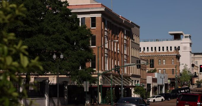 Sunny afternoon view of the historic buildings and skyline of downtown Jackson, Mississippi, USA.