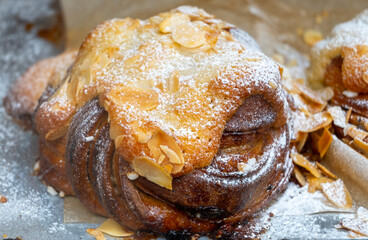 Almond scones - traditional British baked good, popular in the United Kingdom and Ireland, tea buns make with yeast with different toppings